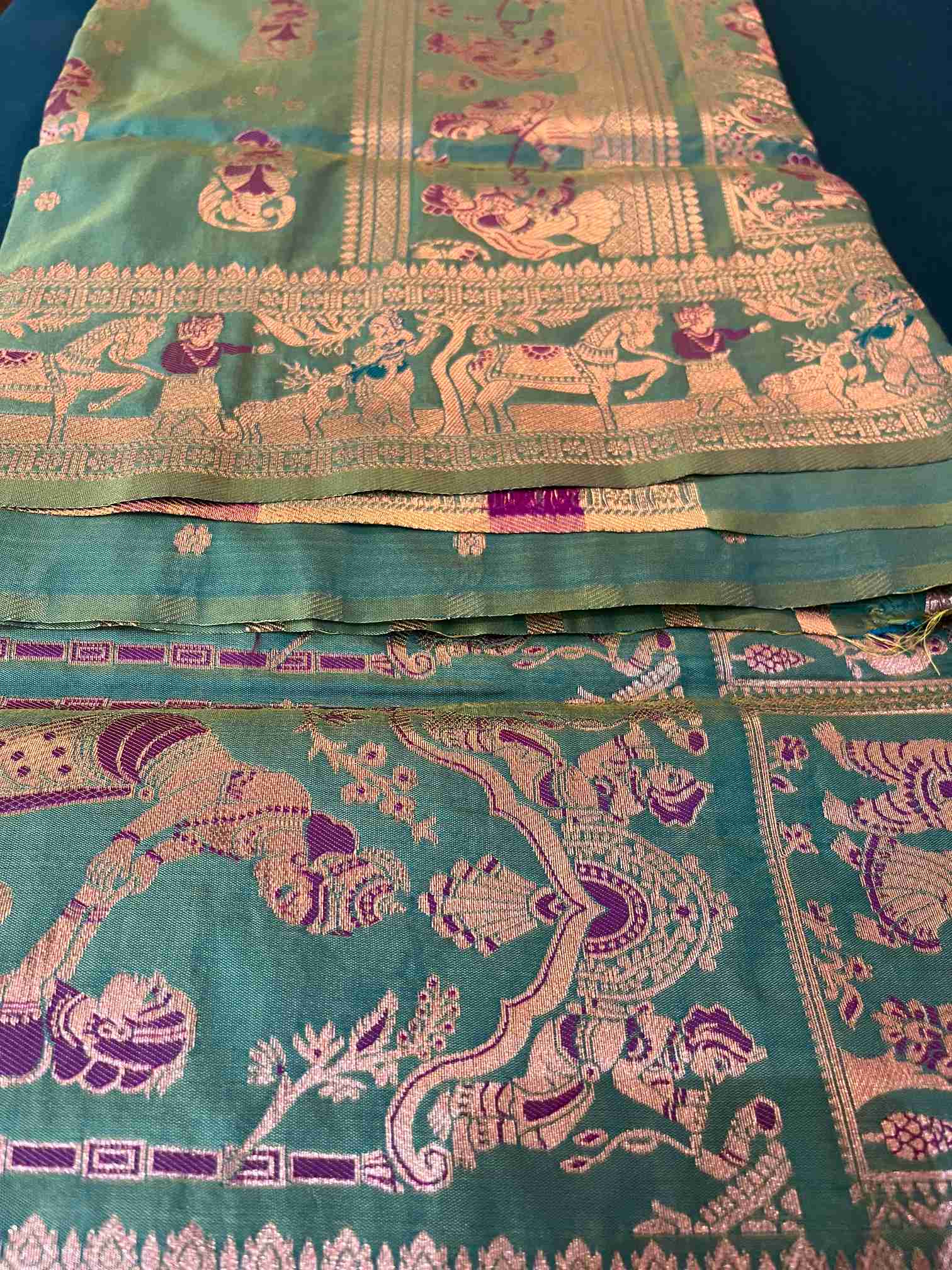 Swarnachari Silk Saree in Sea Green with Mythological Zari Panels